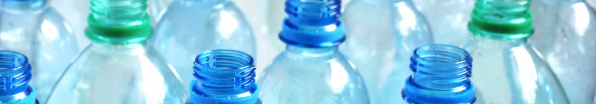a photo of empty plastic bottles close up